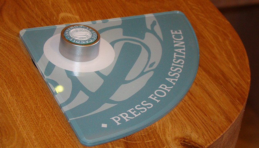Press for assistance button sign graphic for candle shop in Cornwall